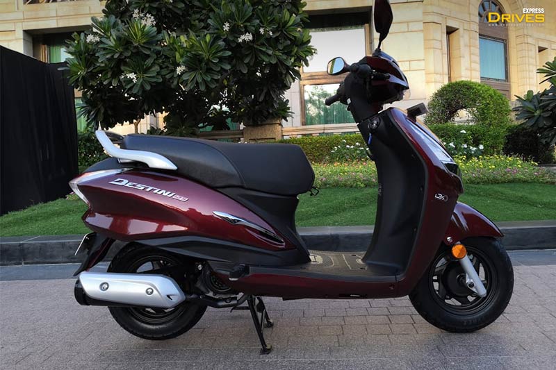 Hero Destiny 125 has a width of 729 mm, stands tall at 1164 mm and has a ground clearance 155 mm. The scooter weighs 111.5 kgs and carry a maximum payload of 130 kilograms. The Destiny is also 1809 mm longer.