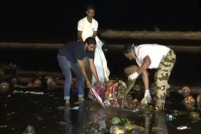 At least 250 personnel from the force cleaned a stretch of the Juhu beach in Mumbai early Friday morning. (ANI)