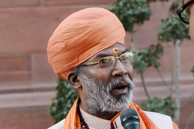 Sakshi Maharaj said that those who worship Lord Shiva and Lord Ram needed “pure” hearts and suggested that being a non-vegetarian, Rahul Gandhi lacks that "purity" Sakshi Maharaj said that those who worship Lord Shiva and Lord Ram needed “pure” hearts and suggested that being a non-vegetarian, Rahul Gandhi lacks that "purity"