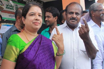 H D Kumaraswamy accompanied Anitha to the Ramanagar deputy commissioner's office where she filed her nomination papers. (PTI)