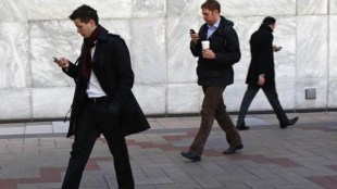 Lithuania, latest news, important news, tech news, mobile banned, cell phones banned in lithuania streets,