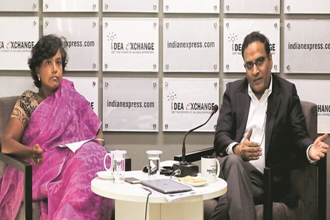 Ayushman Bharat CEO Indu Bhushan with Senior Assistant Editor Abantika Ghosh in The Indian Express newsroom (Express photo: Abhinav Saha)