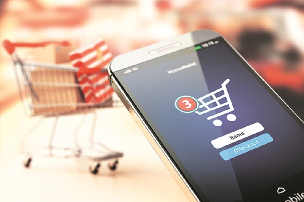Online shopping concept nackground. Mobile phone or smartphone with cart and boxes and bag. 3d