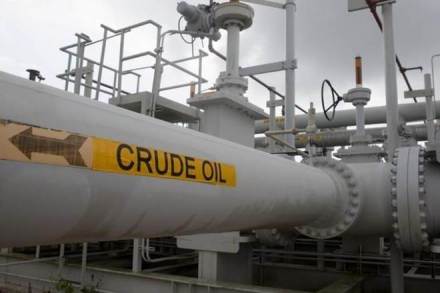 Crude oil prices stable on expected OPEC cuts, but surging US supply drags