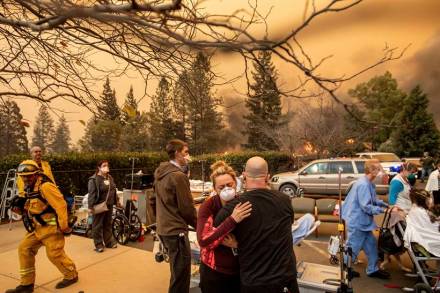 California wildfire: Firefighters battle blazes on two fronts, toll reaches 50 in US