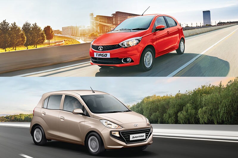 The Hyundai Santro was launched late last month, and while it has a lot of exciting segment first features, it misses a few as well. We compare it with its primary rival the Tata Tiago. We compare the Santro with the Tiago on the basis of their interiors and the features that they offer.