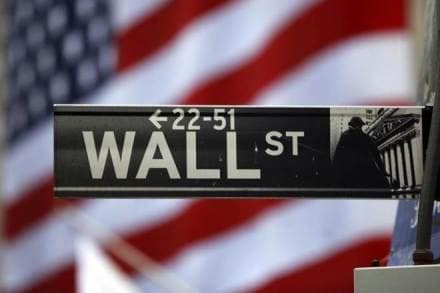 Wall Street ends flat as nervous investors flock to defensive shares