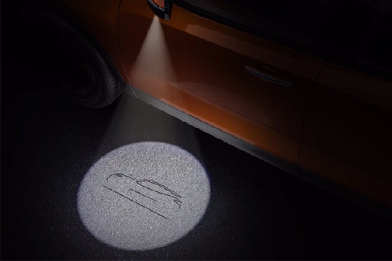 Now, this has to be one of the most appealing highlights of the Tata Harrier. The SUV will come with projector puddle lamps that project the image of the silhouette of the Harrier. Exciting because the said feature is usually only limited to luxury cars like Audis, BMWs, Mustangs and more.