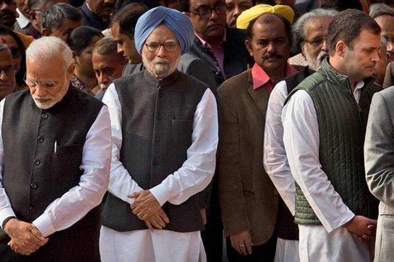 Former Prime Minister Manmohan Singh seen along with Prime Minister Narendra Modi and Congress Chief Rahul Gandhi