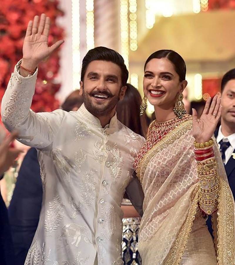 Newlyweds Bollywood actor Ranveer Singh and his actress wife Deepika Padukone at the wedding ceremony of Isha and Anand. (Image: PTI)