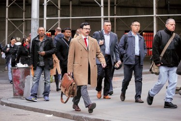 Pedestrians in New York. The nation that most of the world sees as an immigration heaven has a daily struggle with assimilating a myriad of skin colours bloomberg