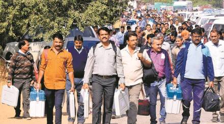 Congress Party workers display Congress President Rahul Gandhi's cutout as they celebrate the initial trends showing the party lead in the states Assembly elections, at the Congress headquarters in New Delhi (PTI)