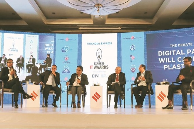 FE Managing Editor Sunil Jain, Visa’s India and South Asia country head TR Ramachandran, SBI managing director PK Gupta, iSPIRT co-founder Sharad Sharma, NPCI managing director and CEO Dilip Asbe and PwC partner and fintech leader Vivek Belgavi at the Express IT Awards in Mumbai