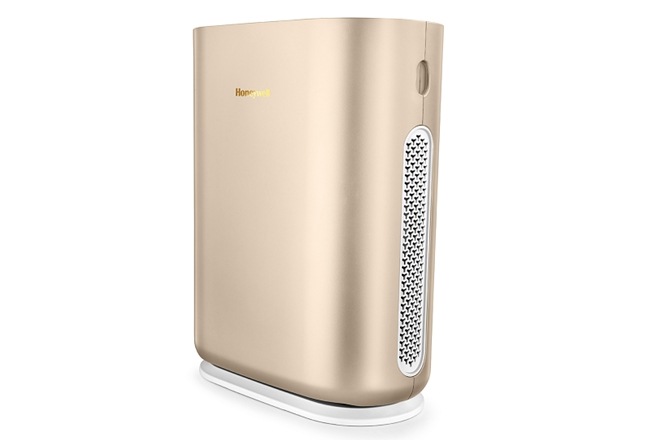 The air purifier displays the AQI level on the LED screen itself, with the blue light indicating clean, orange/yellow indicating a problem and red means you start praying.