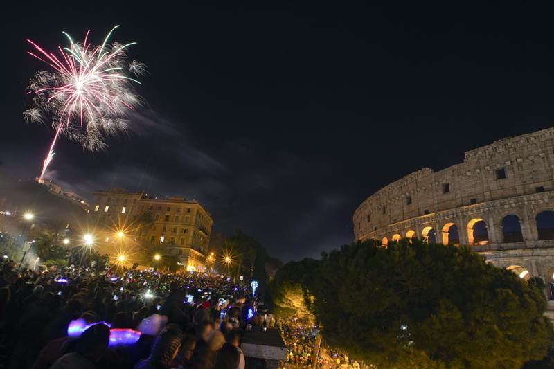 Fireworks over Rome's iconic Colosseum during New Year's celebrations, in Rome (AP Photo)