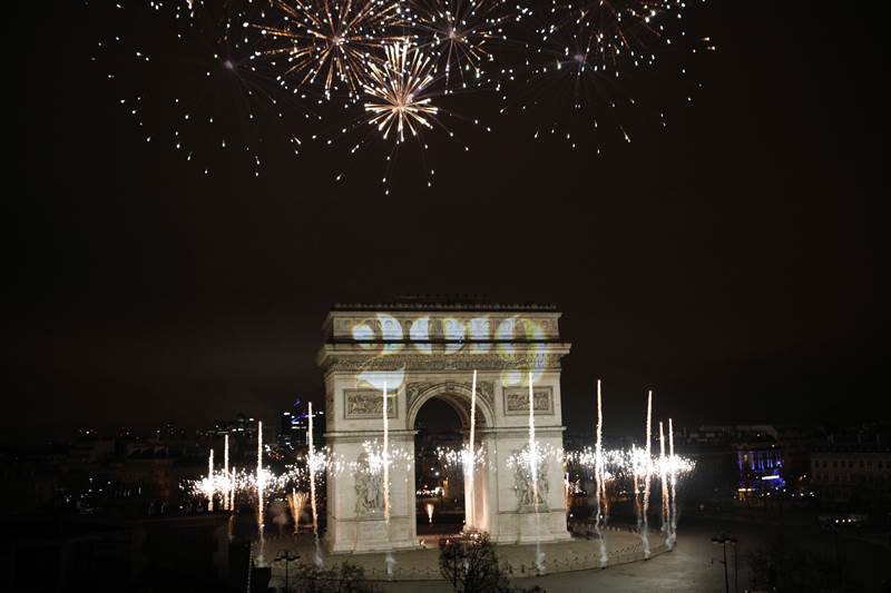 Paris's iconic Arc de Triomphe during the New Year's Day celebrations on the Champs Elysees (AP Photo)