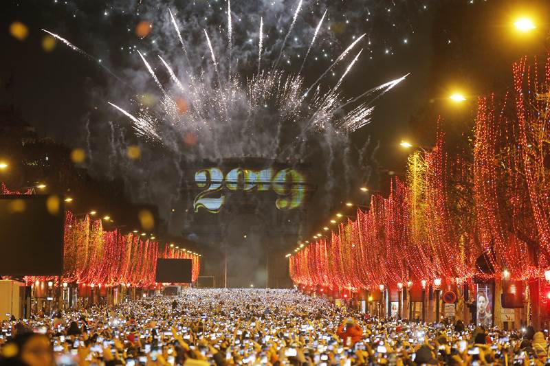 Fireworks explodes over the sky over the Arc de Triomphe on the Champs Elysees, in Paris. (AP Photo)