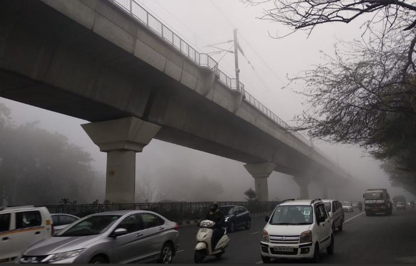 Dense fog enveloped several parts of the national capital, leading to disruption in flight operations at the Indira Gandhi International Airport. Arrivals and departures have largely been put on hold at the IGI airport. Two flights were also diverted between 5.30 AM and 8.30 AM. (Delhi Cant on Friday morning: ANI)