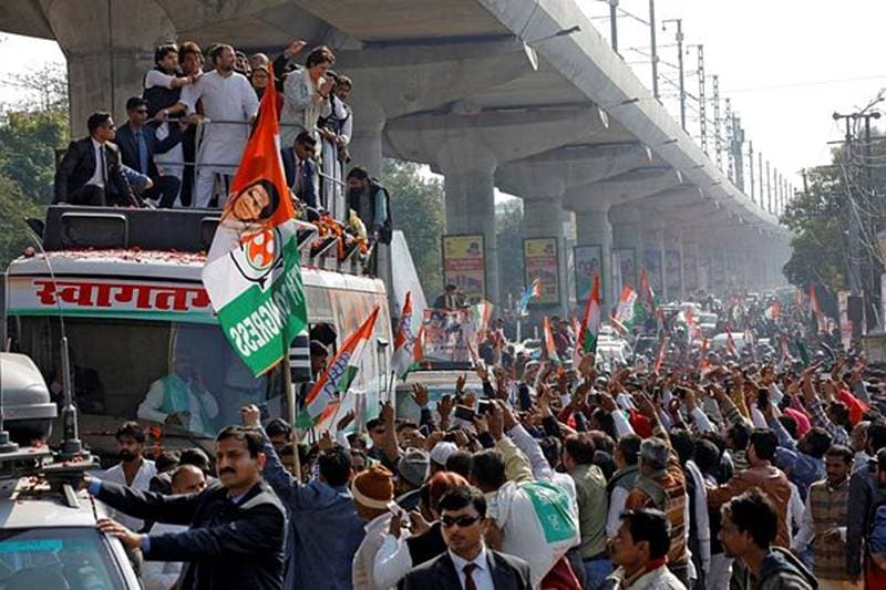 Priyanka Gandhi Vadra, a leader of India's main opposition Congress party and sister of the party president Rahul Gandhi, greets her supporters from atop a vehicle during a roadshow in Lucknow, India, February 11, 2019. REUTERS