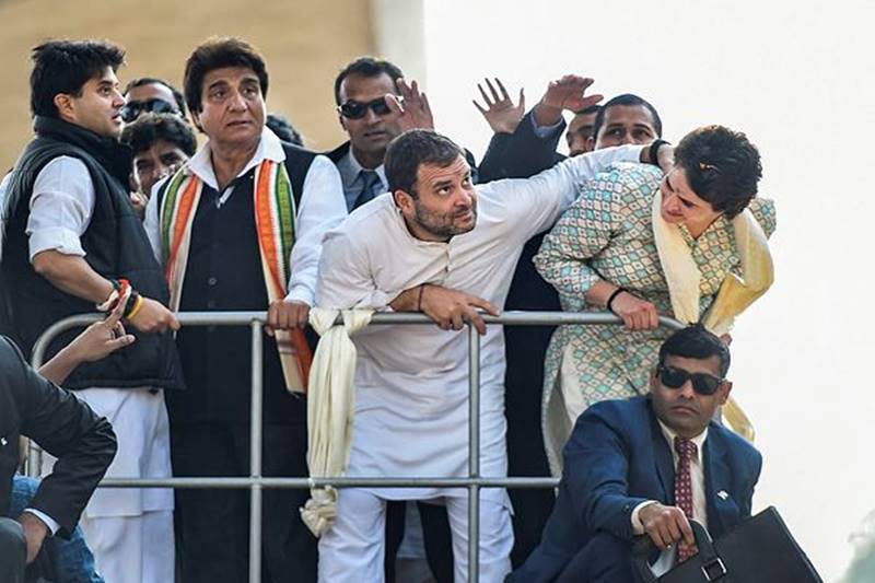 Priyanka Gandhi Vadra, a leader of India's main opposition Congress party and sister of the party president Rahul Gandhi, greets her supporters from atop a vehicle during a roadshow in Lucknow, India, February 11, 2019. REUTERS
