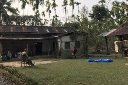 Relatives and neighbours at the house of Jagat Phukan in Jagibari village of Golaghat — one of the victims whose body lies packed in blue.