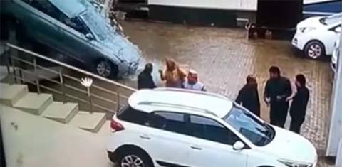Video: Woman crashes Hyundai Elite i20 through showroom glass into other cars!