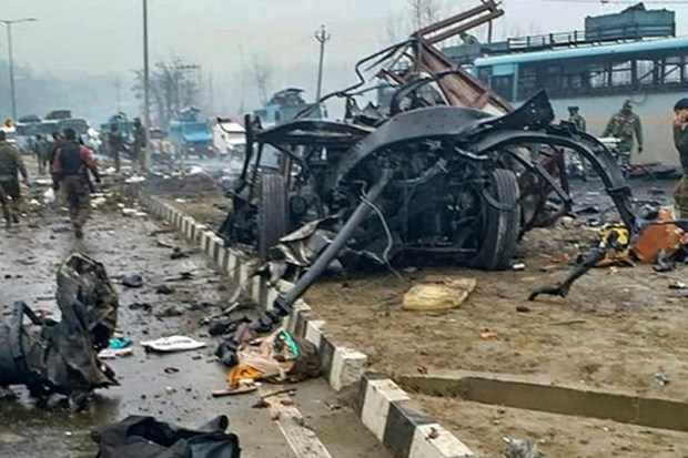 Pulwama terror attack: In the worst-ever terror attack in Jammu and Kashmir, a suicide bomber rammed his explosive-laden vehicle into a Central Reserve Police Force (CRPF) convoy on the Srinagar-Jammu highway in Pulwama district. The blast was followed by gunshots by terrorists at around 3.15 pm on Thursday evening. Pakistan-based terrorist group Jaish-e-Mohammad (JeM) took responsibility for the terror attack in Pulwama in south Kashmir. A scene of the spot after in Pulwama district on Thursday, (PTI Photo)