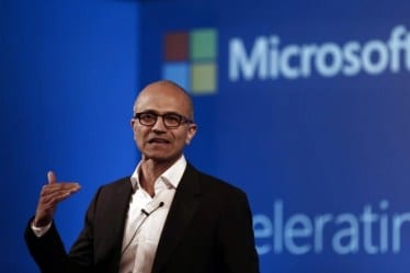 Satya Nadella giving off some tips to his employees on how to make users cool (Source: Reuters)