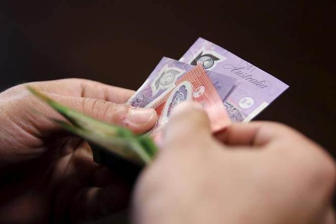 Australia, New Zealand dollars in a sweat as rate cut fever spreads