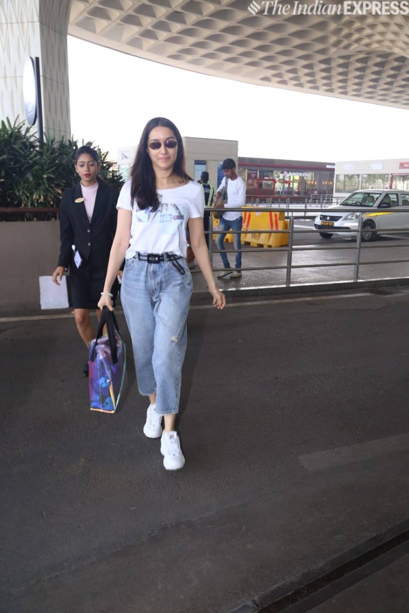 Gold hovers near 2-week lows as dollar gains on upbeat US data