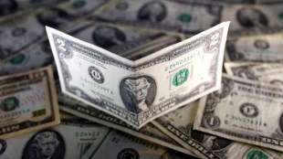 Dollar rises as more central banks turn dovish, defies lower Treasury yields