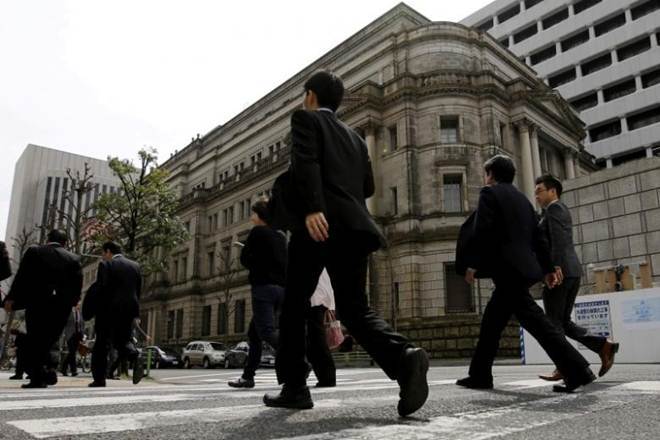 Japanese shares advance on Wall Street rally, weaker yen