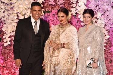 Akshay Kumar and wife Twinkle Khanna posed for shutterbugs with Rekha. (Express Photo)