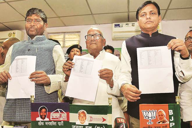 NDA seat sharing alliance in Bihar: BJP state President Nityanand Rai (R) with JD (U) state President Vashisht Narayan (C) and LJP state President Pashupati Paras (L). in Patna 