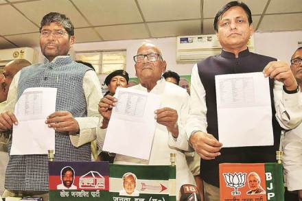NDA seat sharing alliance in Bihar: BJP state President Nityanand Rai (R) with JD (U) state President Vashisht Narayan (C) and LJP state President Pashupati Paras (L). in Patna 