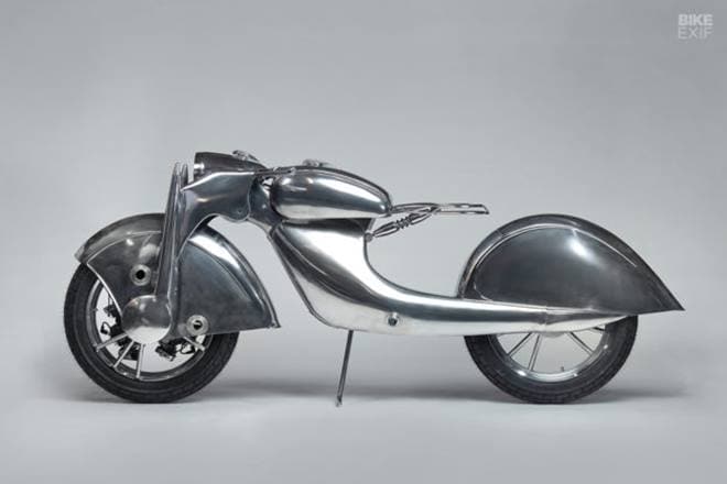 The motorcycle is fully finctional but the project was commissioned mostly as an art bike. But imagine looking at The Killer ride down the road - won't that be a sight! The engine built by fusing three identical engines together.