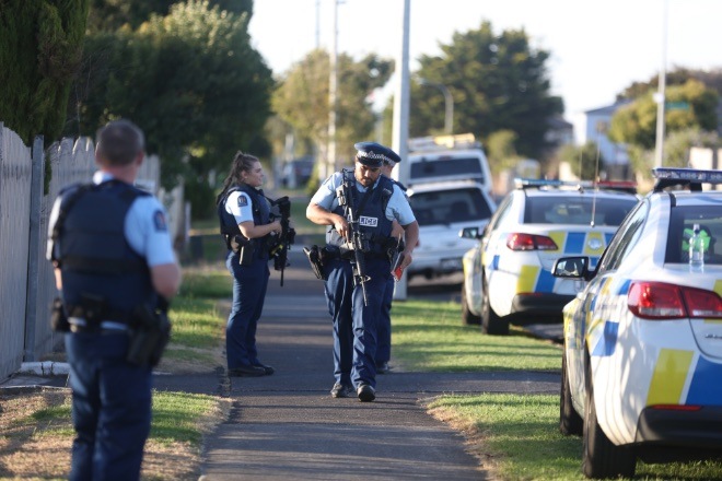 Armed police maintain a presence outside the Masijd Ayesha Mosque in Manurewa on March 15. Photographer: Phil Walter/Bloomberg
