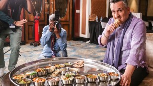 Gold slips as equities gain on trade talk progress, China data