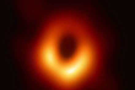 The M87 black hole is 55 million light years away from Earth, and packs a mass roughly equivalent to over 6.5 billion Suns. The M87 black hole is 55 million light years away from Earth, and packs a mass roughly equivalent to over 6.5 billion Suns.
