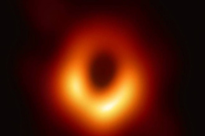 The M87 black hole is 55 million light years away from Earth, and packs a mass roughly equivalent to over 6.5 billion Suns. The M87 black hole is 55 million light years away from Earth, and packs a mass roughly equivalent to over 6.5 billion Suns.