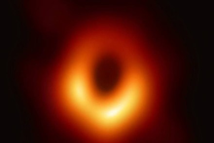 The M87 black hole is 55 million light years away from Earth, and packs a mass roughly equivalent to over 6.5 billion Suns. The M87 black hole is 55 million light years away from Earth, and packs a mass roughly equivalent to over 6.5 billion Suns.