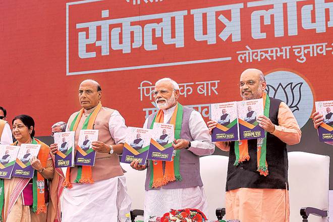 Prime Minister Narendra Modi, BJP president Amit Shah and Union home minister Rajnath Singh release the BJP manifesto for Lok Sabha elections 2019, in New Delhi. (PTI)