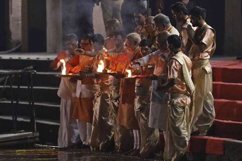 Prime Minister Narendra Modi's four- hour road show ended at the Dashashwamedh ghat, where Modi took part in the "Ganga Aarti". The Prime Minister also performed a puja. (AP Photo)