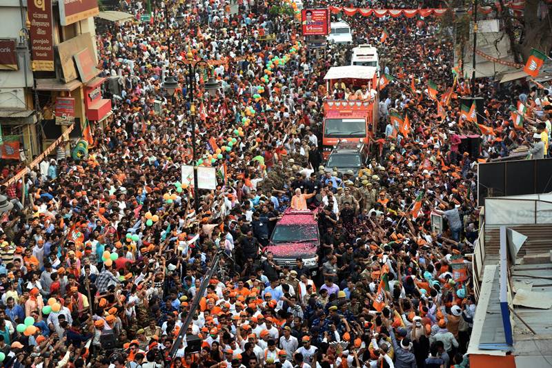 The Prime Minister commenced his seven-kilometer roadshow by garlanding the statue of Pandit Mohan Malviya. Malviya was the founder of Banaras Hindu University. (PTI Photo)