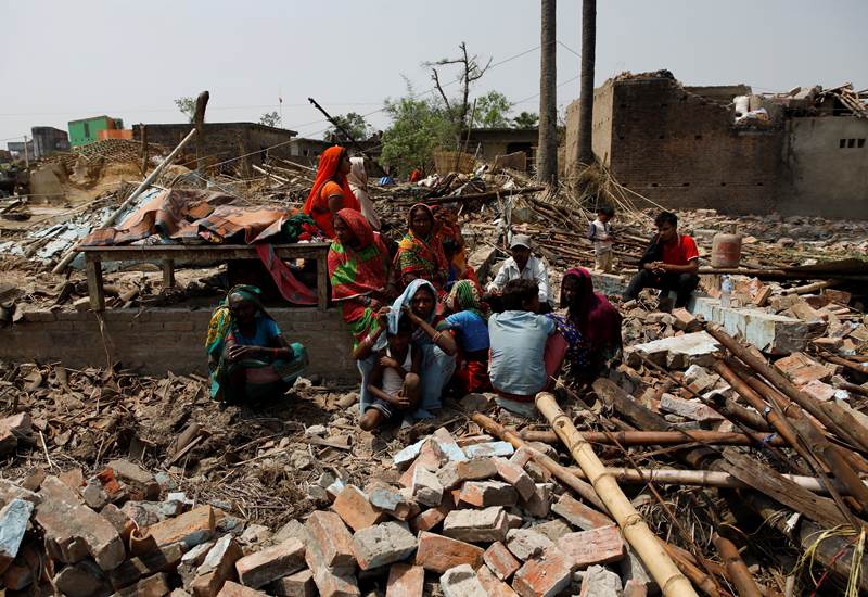 According to police, most of the deaths have been caused by either collapse of wall or falling of bricks in homes, uproot of trees and electrical poles. (Reuters Photo)