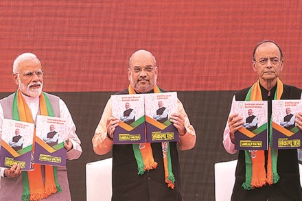 From Left, Prime Minister Narendra Modi, Bharatiya Janata Party (BJP) president Amit Shah and Finace Minister Arun Jaitley release BJP's manifesto for the upcoming general elections in New Delhi on Monday. (Express Photo: Neeraj Priyadarshi)
From Left, Prime Minister Narendra Modi, Bharatiya Janata Party (BJP) president Amit Shah and Finace Minister Arun Jaitley release BJP's manifesto for the upcoming general elections in New Delhi on Monday. (Express Photo: Neeraj Priyadarshi)