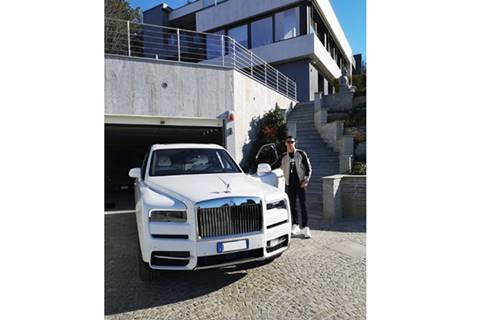Cristiano Ronaldo with his Rolls Royce Cullinan