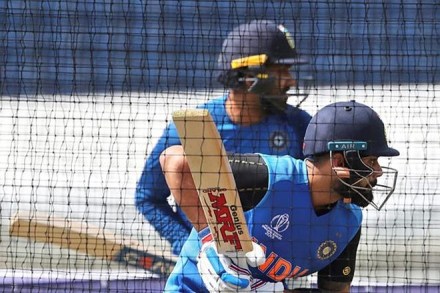 Captain Virat Kohli, right, and Rohit Sharma bat in the nets during a training session ahead of their Cricket World Cup warm up match against Bangladesh at Sophia Gardens in Cardiff, England. (AP Photo)