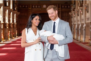 Britain's Prince Harry and Meghan, Duchess of Sussex are seen with their baby son (Reuters Photo)