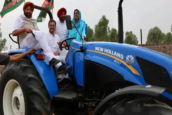 Congress president Rahul Gandhi drives a tractor in Ludhiana on Wednesday. (Source: ANI) Congress president Rahul Gandhi drives a tractor in Ludhiana on Wednesday. (Source: ANI)